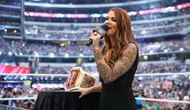 Lita presenting the new Raw Women's Championship at Wrestlemania 32